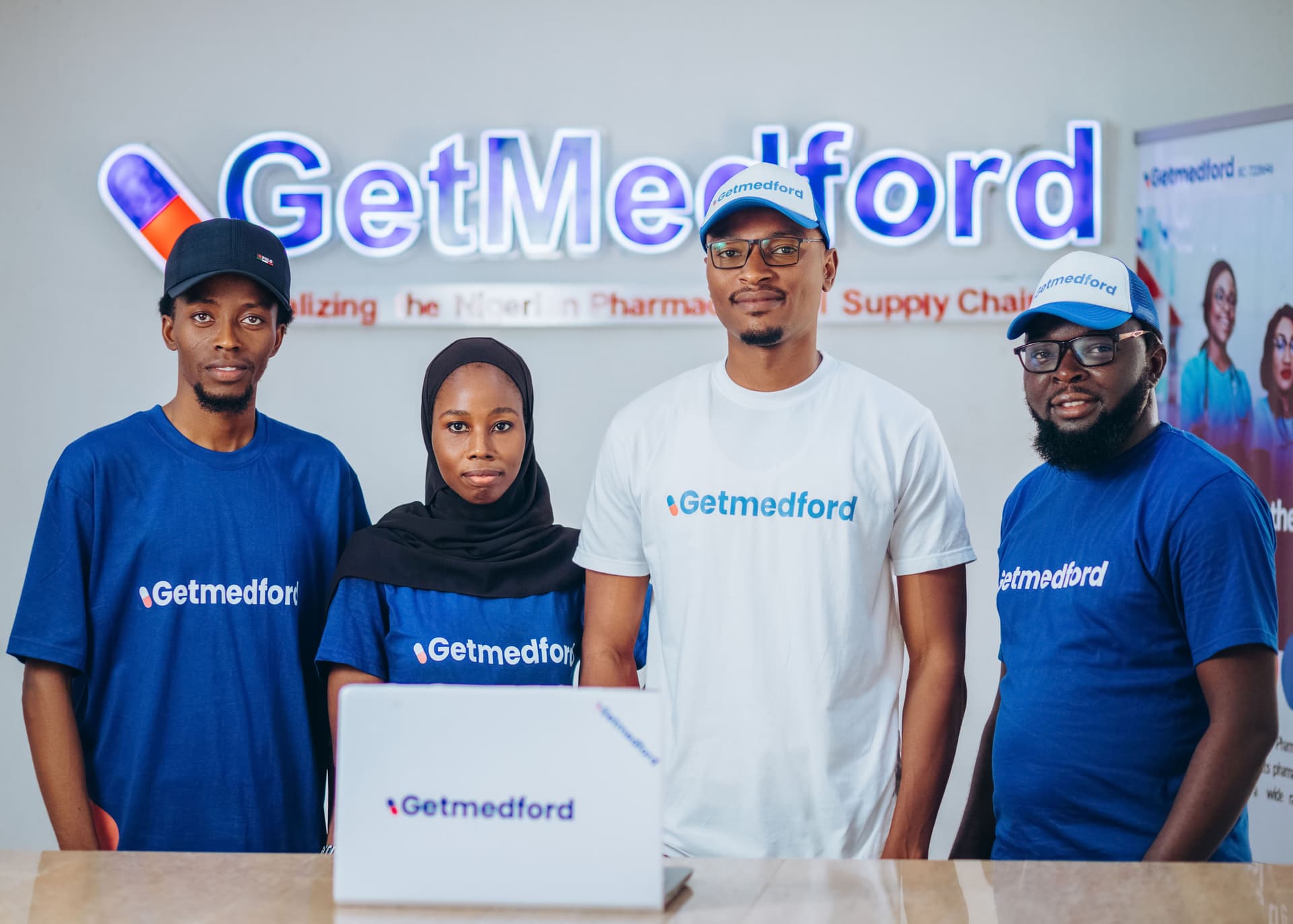 GetMedFord team helping a customer